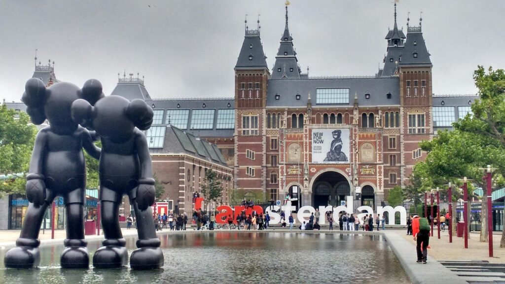 pexels-photo-208733-208733 The Rijksmuseum facade with modern art sculptures and reflection in Amsterdam. You can read my Amsterdam travel tips for effortless travel.