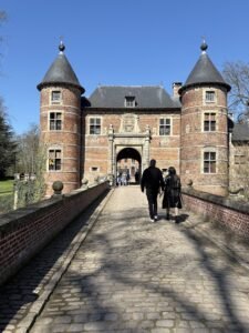 Historic castle with people walking